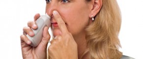 Adult using Ear Popper to relieve ear discomfort when flying