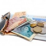 passport, sunglasses and foreign money