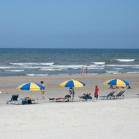sunbathers on Daytona Beach sunbathers on Daytona Beach