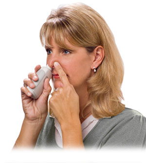 Adult using Ear Popper to relieve ear discomfort when flying
