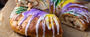 King Cake: Louisiana Mardi Gras Tradition 2 Colorful King Cake with Mardi Gras decorations, traditional New Orleans pastry.