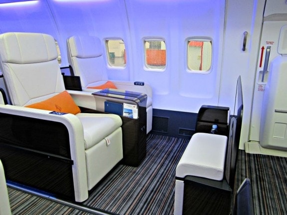 The interior seating area on the Beoing 757 Four Seasons jet is spacious with lots of leg room