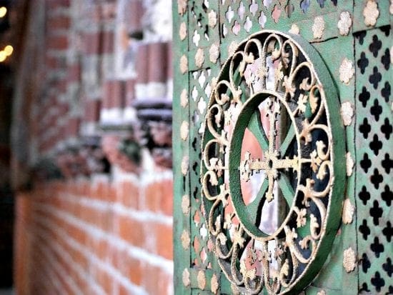 filigree artwork on wall in chapel at malbork castle poland