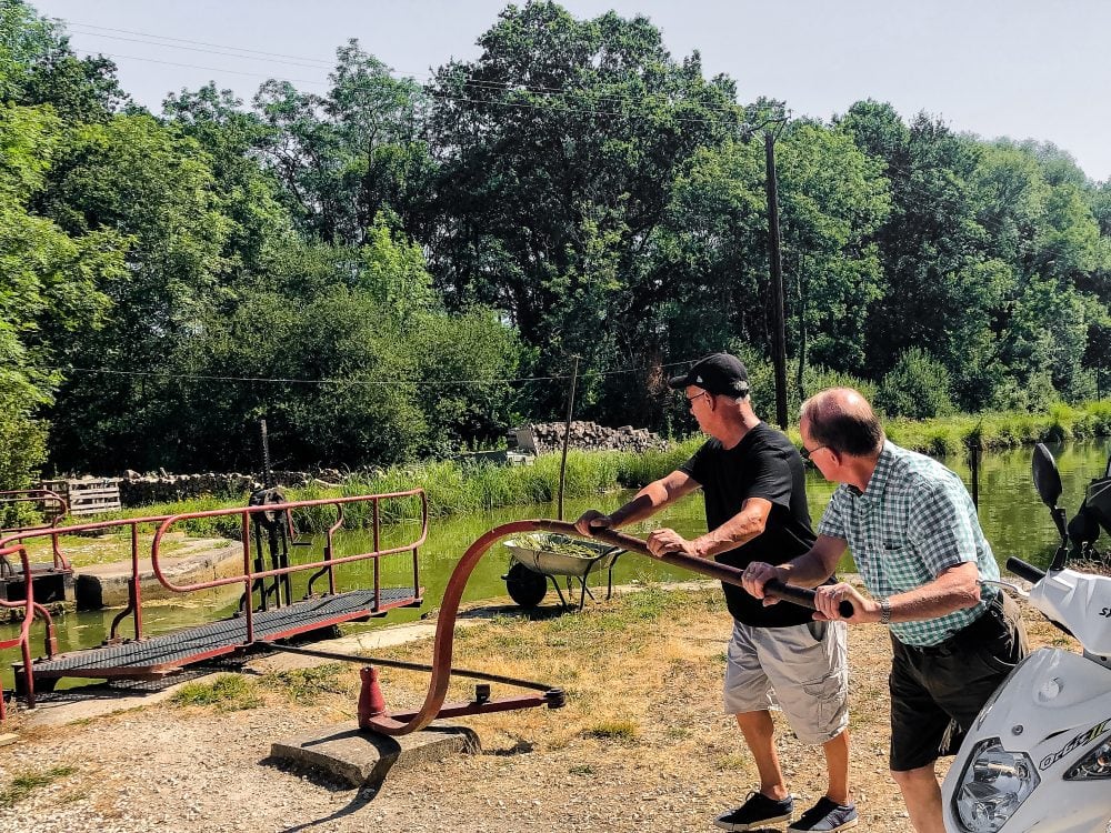 Tony helps opens one of the locks on the French canals in Burgundy