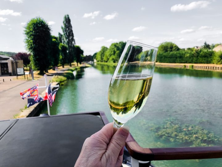 A champagne toast, one of many, onboard our European Waterways luxury barge cruise.