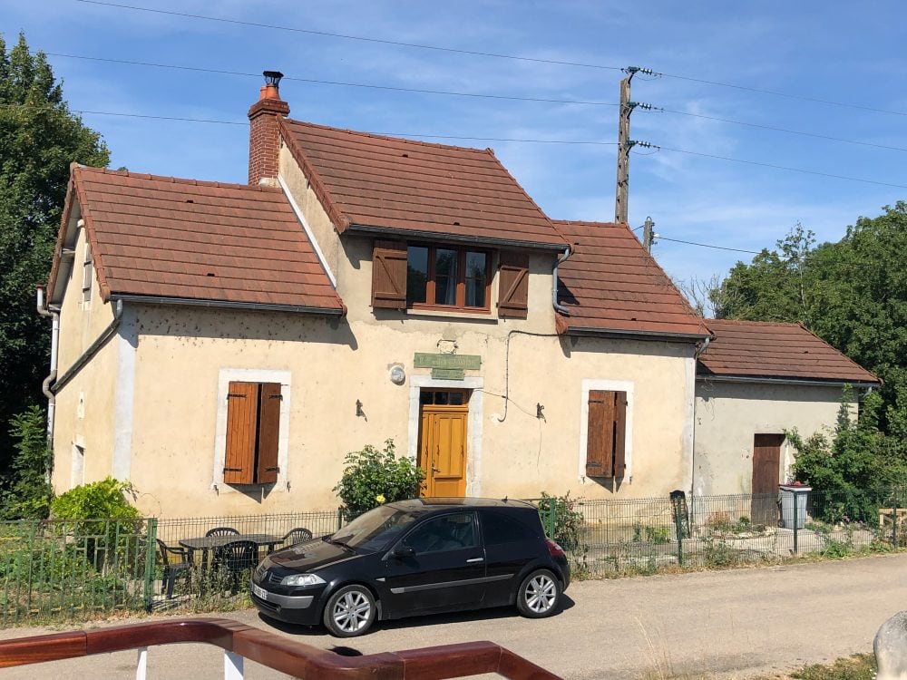 You can easily hop off at one lock to walk or bike along the towpath adjacent to the canal, catching up to the barge when it was convenient. This is a lockmaster's house.