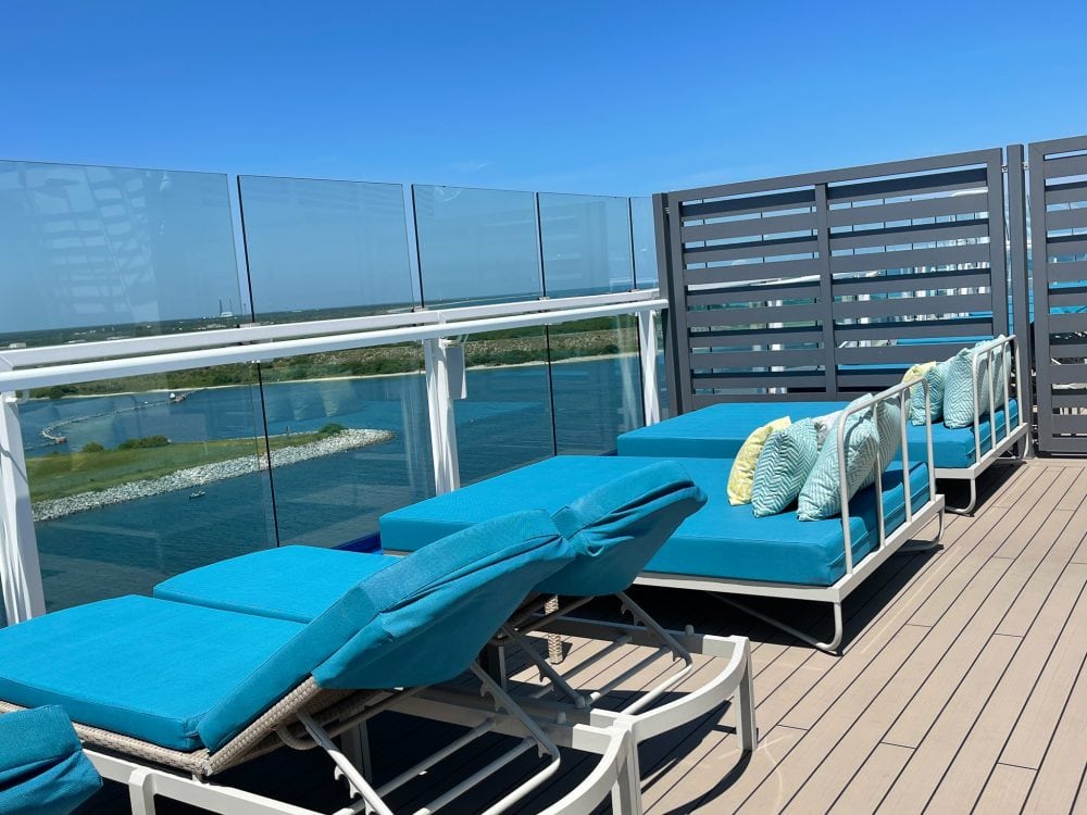 lounge chairs on a cruise ship deck