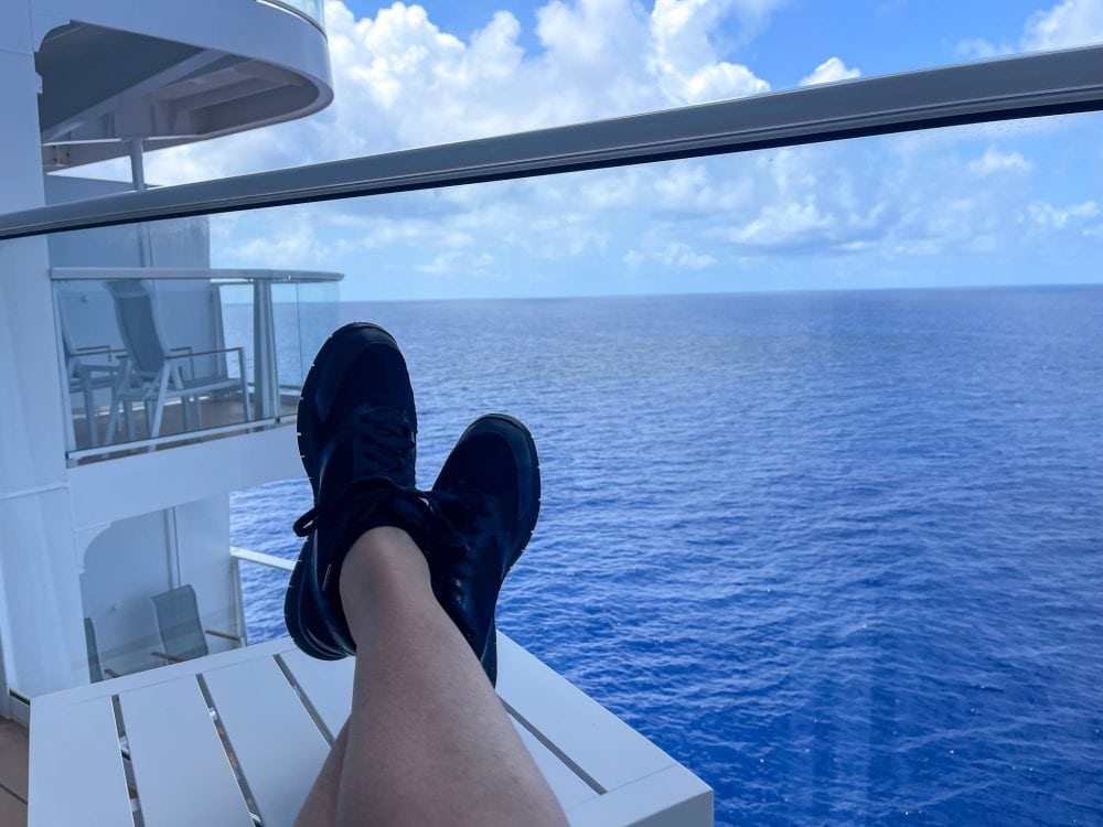 feet up on a cruise ship balcony