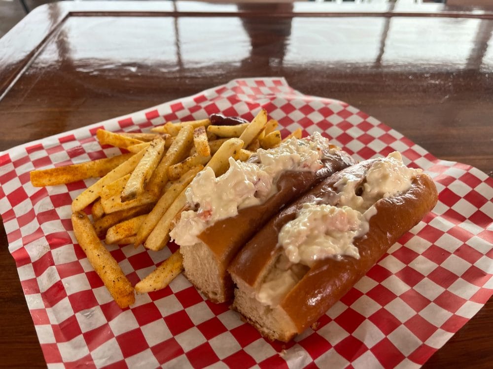 lobster roll with a side of fries