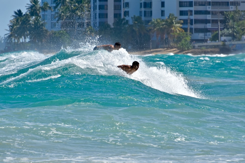 Surfing at Condodo Beach, Puerto Rico