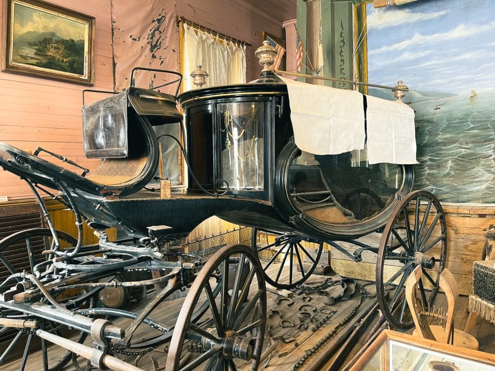 A black funeral stagecoach found at the Bodie museum