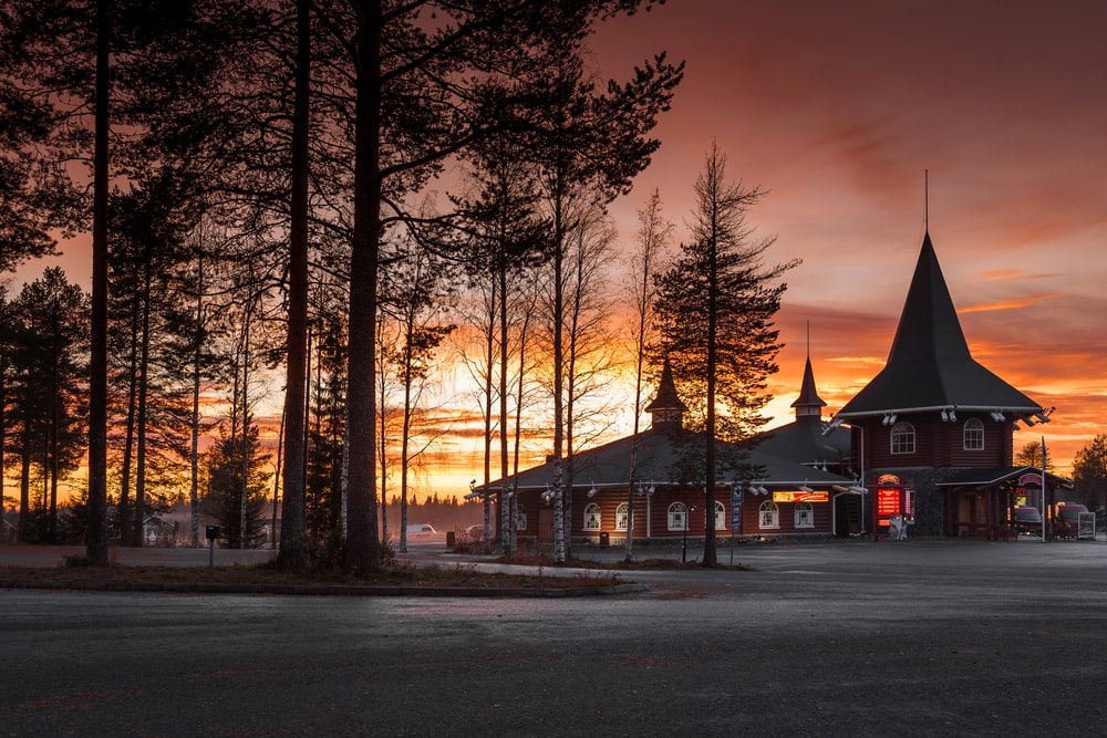 aurora borealis dancing over a hotel in rovaniemi the capital of finnish lapland