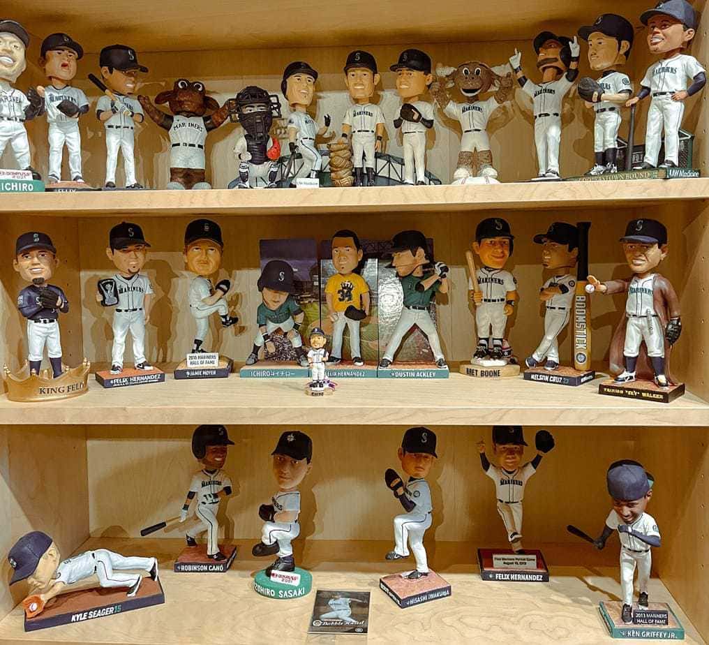 a display case of bobbleheads at