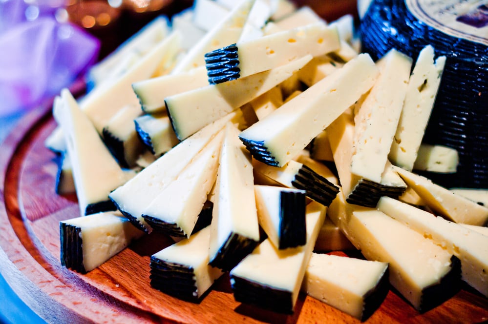Pecorino cheese cut into easy serving strips.