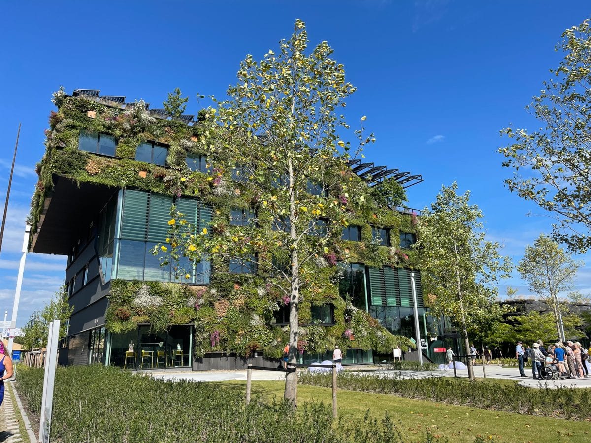 ivy covered multi-storied building at the eco horticulture floriade in the netherlands