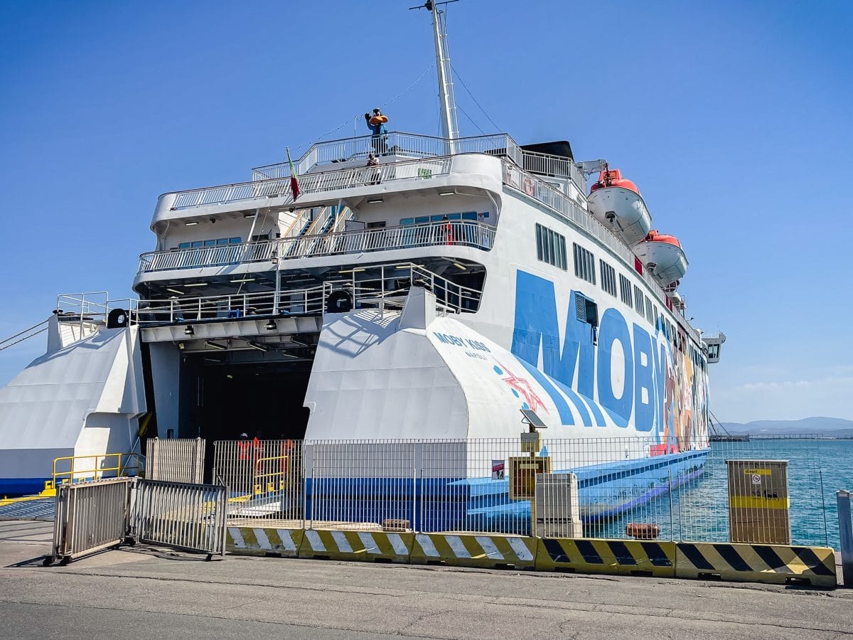 a moby ferry boat on the water in tuscany