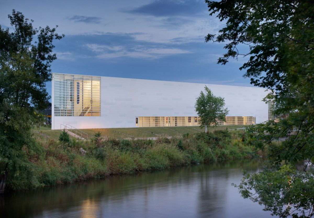 exterior shot of the the museum of wisconsin art in milwaukee, a white horozontally sleek building