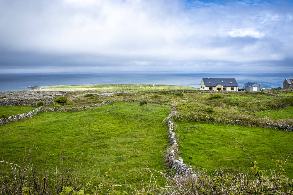 house on a walled farm with a view of the sea in the Aran Islands, Ireland