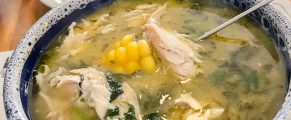 a bowl of ajiaco colombian chicken and potato soup