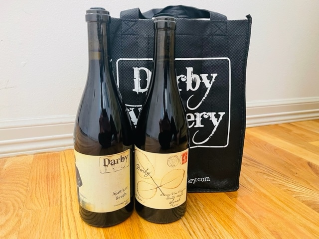 a wine tote bag with two bottles of wine from darby winery