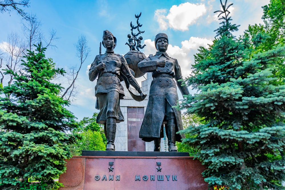 Almaty Park on Astana Square View of the Statue of World War Two Soviet Heroines Aliya and Manshuk on a Sunny Blue Sky Day