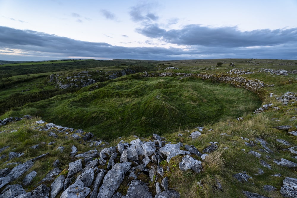 Cahercommaun triple ring fort  also called a fairy fort, situated on the edge of an inland cliff facing, The Burren National Park, County Clare, Ireland