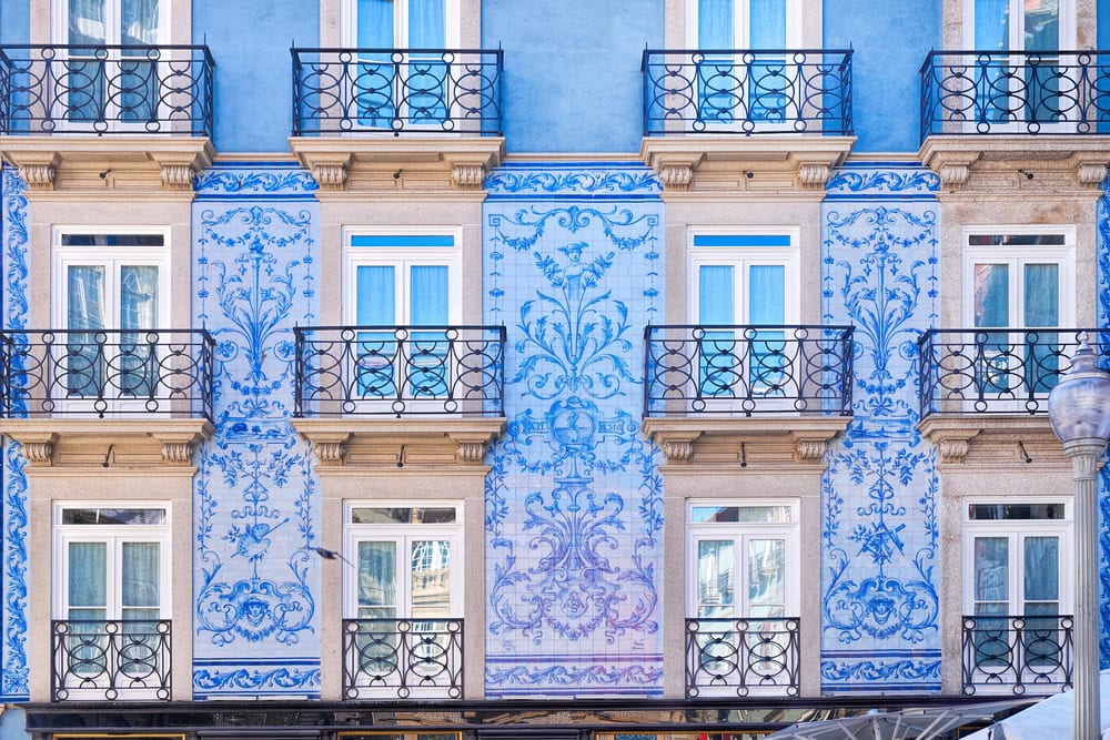 Traditional historic facade in Porto decorated with blue painted tiles, Portugal