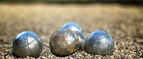 Shopping in Marseille: Souvenirs Worth Taking Home 13 Shiny metallic pétanque balls on gravel court, outdoor game, Traveling with MJ.