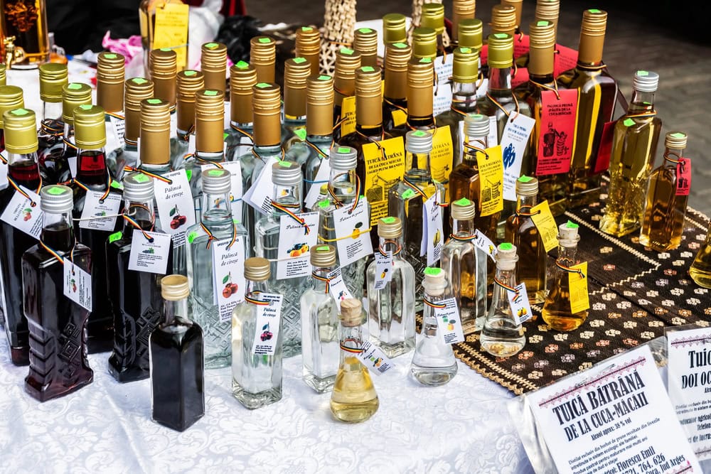 A table with bottles of liquor.