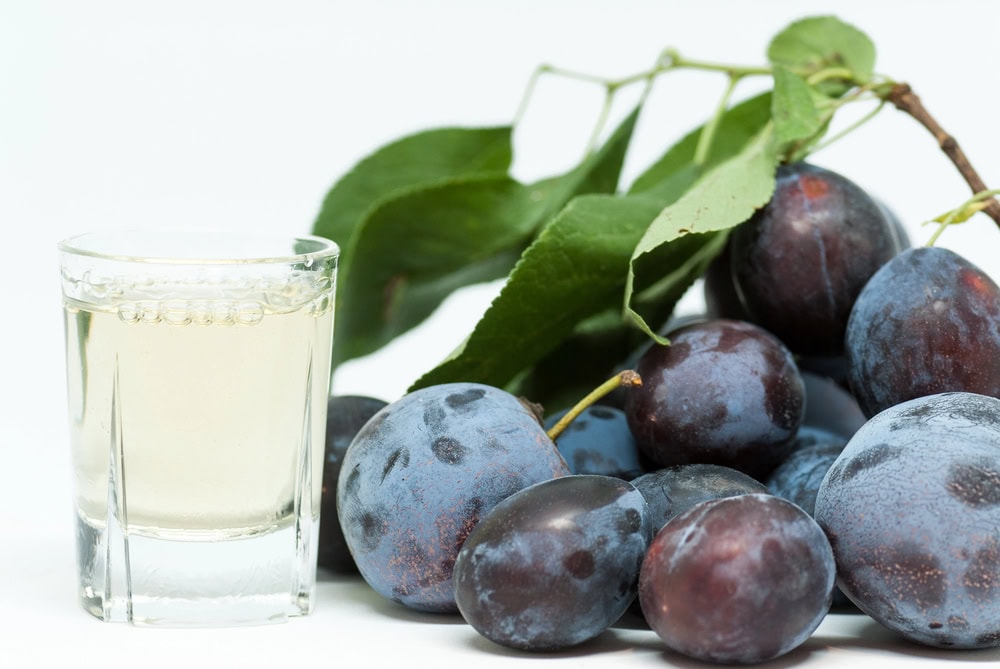 Plums and a glass of wine.
