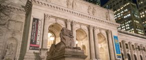 The New York Public Library: A Quiet, Grand Escape in Midtown Manhattan 3 Iconic New York Public Library facade with lion statues and grand architecture at night.