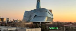 15 Don't Miss Museums in Winnipeg, Manitoba 1 Modern building with unique architectural design in Winnipeg at sunset.